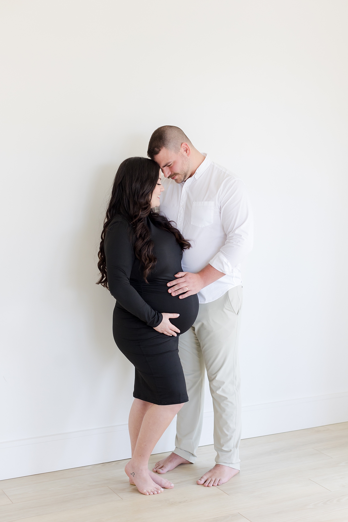 Mom and dad to be in the studio | Image by Emily Gerald Photography